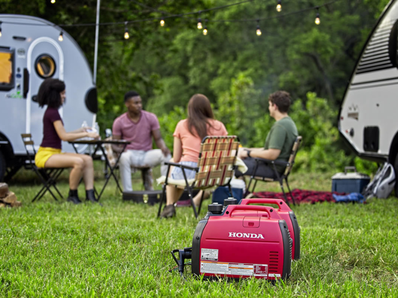 Honda EU2200i portable inverter generator at a campsite