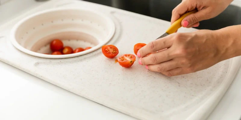 Over-the-Sink Cutting Board with Colander